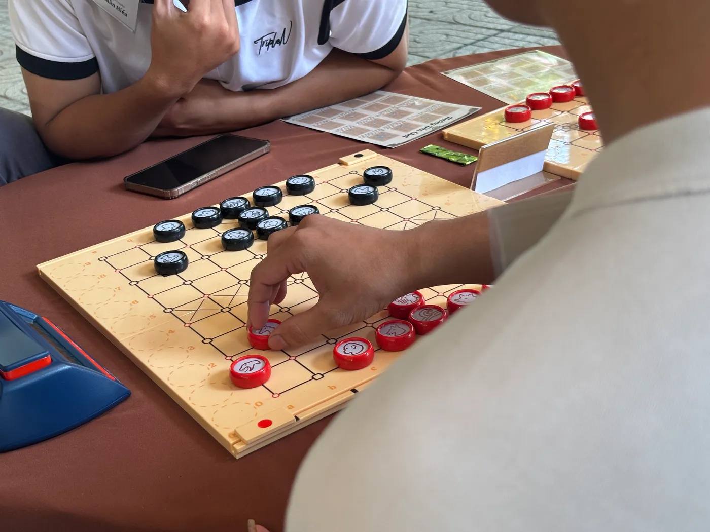 Hình chụp từ vòng bảng giải đấu Danh Kỳ Lưu Truyền tại Trường Cao đẳng Công nghệ cao Đồng An
